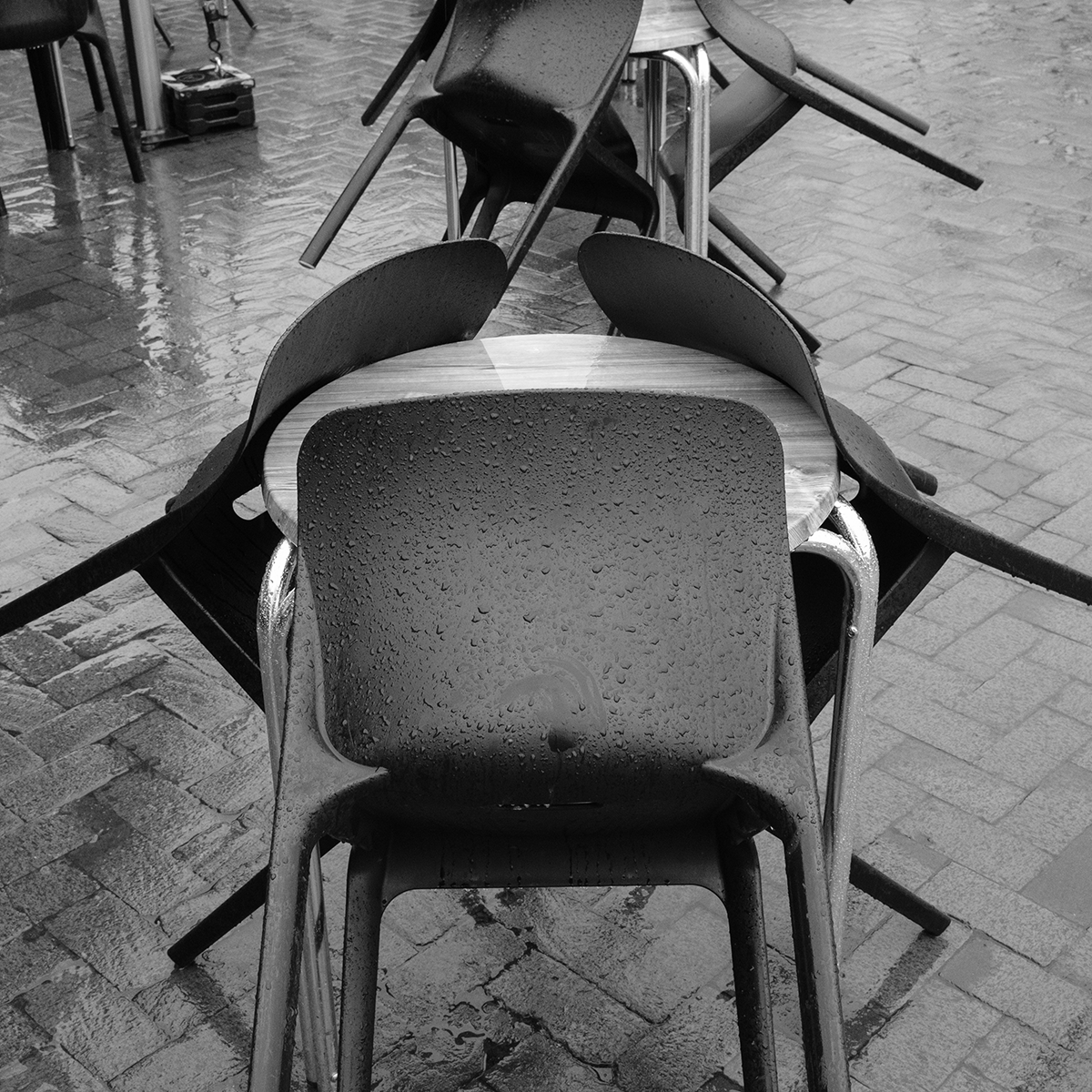 Table and Chairs in Rain link image